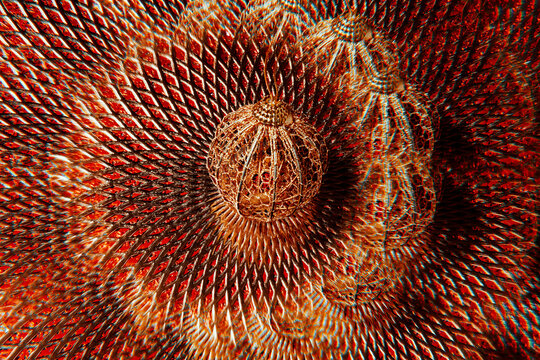 kaleidoscopic image of an intricate golden christmas ball