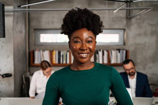 Close Up Portrait Of Smiling Businesswoman In The Office 