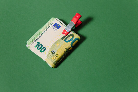 100 euro notes folded and clipped