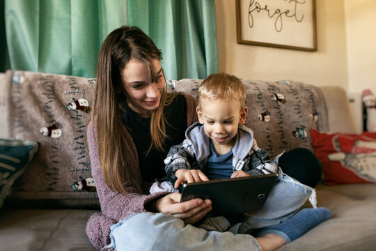 Child With Cerebral Palsy Using Digital Tablet