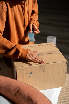 Man packing delivery online purchase 