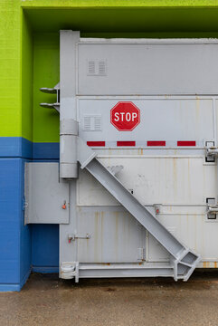 Urban Street Wall with Stop sign on flood gate 