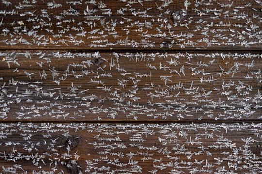 Texture Of Wooden House Wall With Frozen Snowflakes