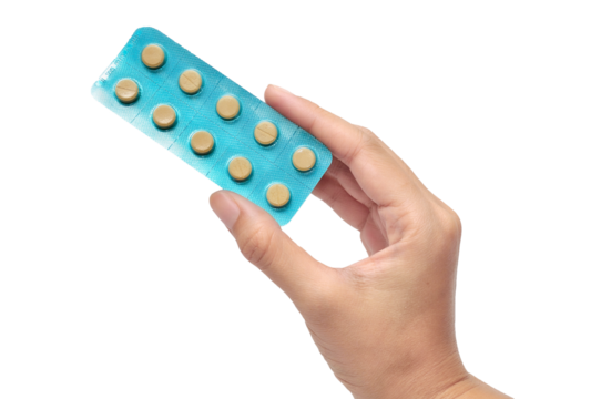 Women holding medicine tablets in a Blister Pack 