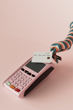 hand paying with a credit card on a pos