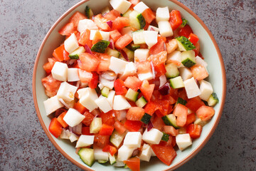 Conch salad native dish of the Bahamas closeup on the plate on the table. Horizontal top view from above