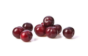 Red plums fruit on white background