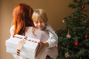 Mother, Daughter and Christmas Present 