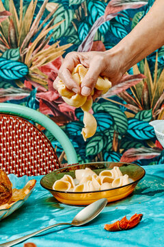 grabbing the pasta of the catalan sopa de galets