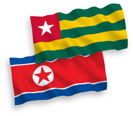 Obraz premium Flags of North Korea and Togolese Republic on a white background