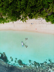 Drone view from above at a tropical beach in the Seychelles, Anse Volbert beach Praslin