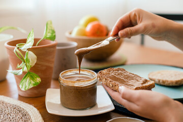 Breakfast time, delicious spread on toast