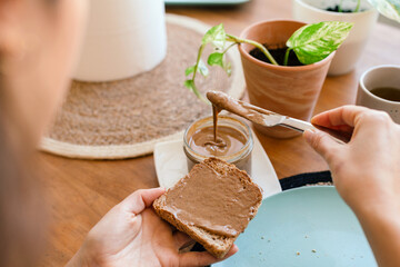Breakfast time, delicious spread on toast