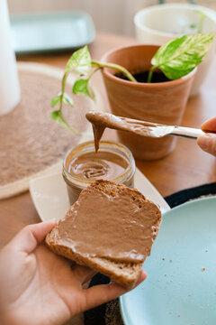 Breakfast time, delicious spread on toast