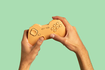 Hands holding gaming gamepad controller 