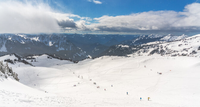 skiers climbing snowy slope, MT Baker
