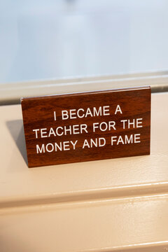 Sign in School about Teacher sarcasm Money and Fame 