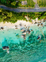 Drone view from above at a tropical beach in the Seychelles Mahe Island