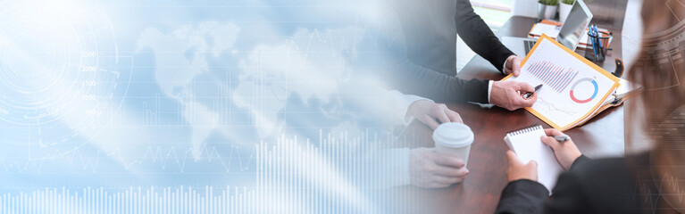 Group of three people working together; panoramic banner