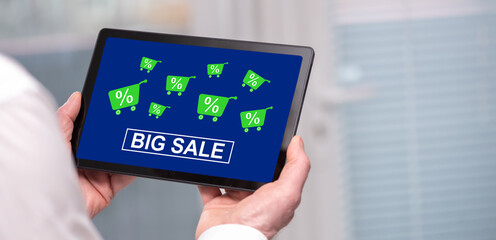 Big sale concept on a tablet