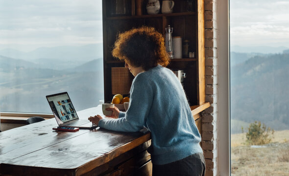 Woman Working Remotely From Her Mountain Home 