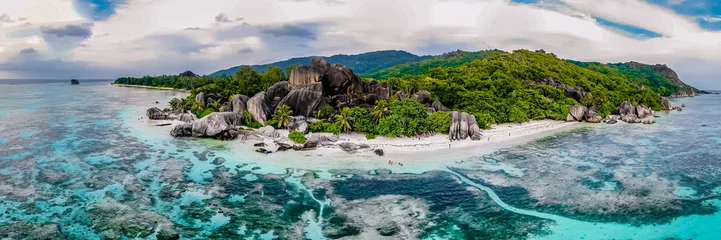 Keuken foto achterwand Anse Source D'Agent, La Digue eiland, Seychellen Drone view from above at a tropical white beach in the Seychelles, Anse Source d'Argent white tropical beach with huge granite boulders at La Digue Island