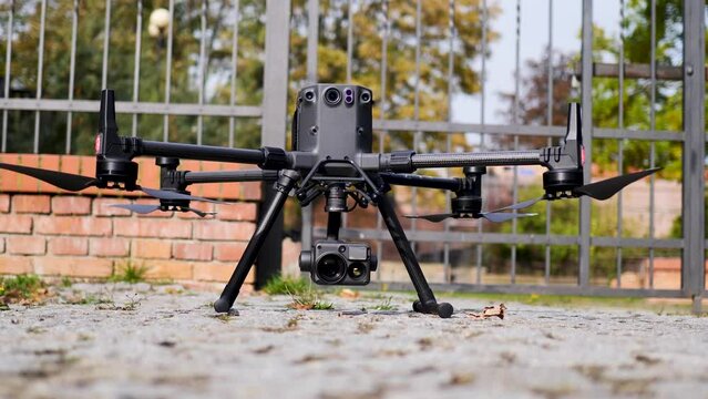 large drone taking off from ground - static steady shot