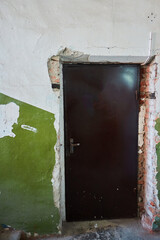 An old door or doorway in a ruined building