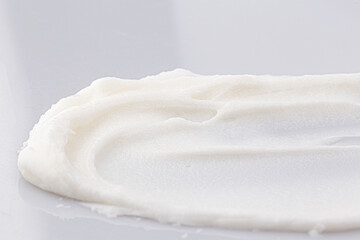 white texture of cosmetic cream background
