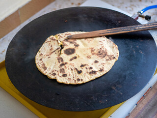 woman makes bread at home