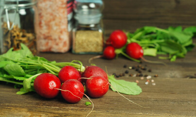 bunch of fresh radishes on kitchen table
