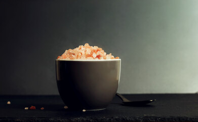 pink himalayan salt on a dark background