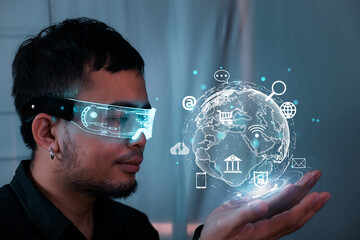 business man presenting graphic world metaverse cyber business In the business technology model,...