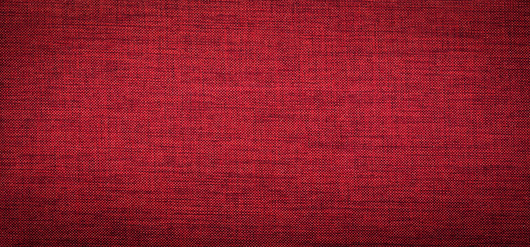 Red fabric texture. Dark burgundy textured background. Cloth texture background.