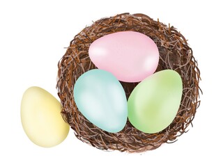 Nest of twigs with Easter eggs in pink, blue, green and yellow separately on a white background, digital drawing.
