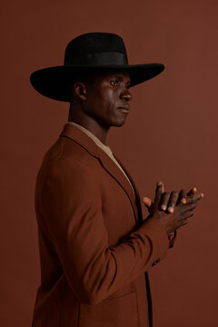 Man in stylish black hat
