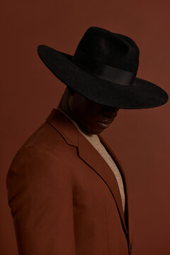 Man in stylish black hat