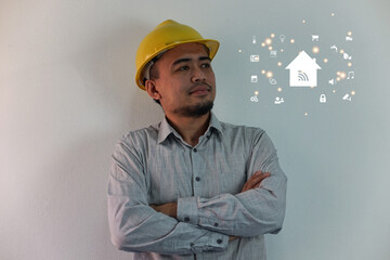 architect man working with blueprints,engineer inspection in workplace for architectural plan,sketching a construction project for smart home