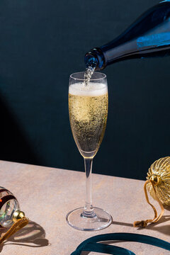 champagne pouring detail from a bottle