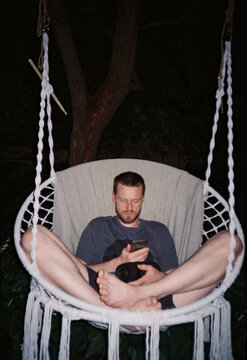 Young man chillin' in a hammock