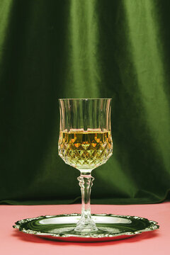 Alcoholic beverage inside goblet glass