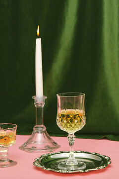 Wine glass with green velvet background