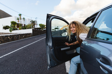 Woman getting out of the car