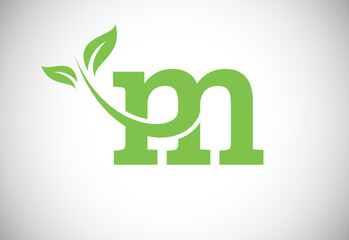 Initial letter M and leaf logo. Eco-friendly logo concept. Modern vector logo for ecological business and company identity