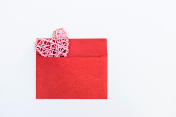 Pink heart on red paper envelope isolate on white background, love and romance concept, valentine card background idea