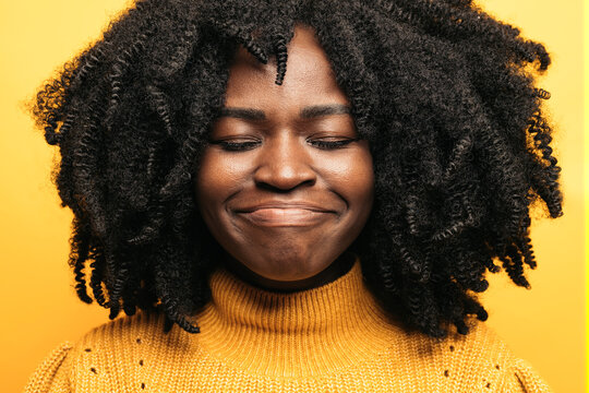 Smiling black woman with positive expression