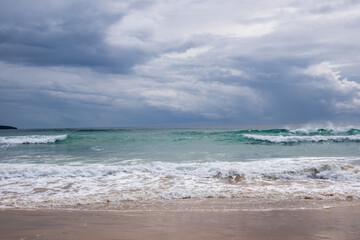 Fototapeta na wymiar breaking wave at pambula beach