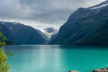 Landscape of the Lovatnet glacial lake with turquoise crystal clear water,  Norway