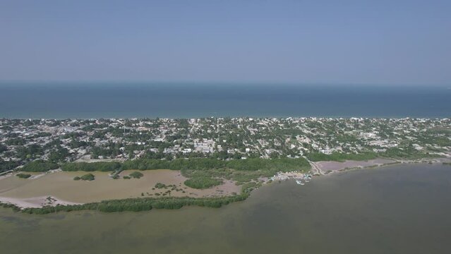 drone view of the fishing town of progreso in yucatan with its mangrove near merida