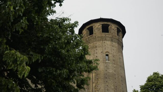 Acaja castle in Turin Italy in slow motion panorama low angle shot